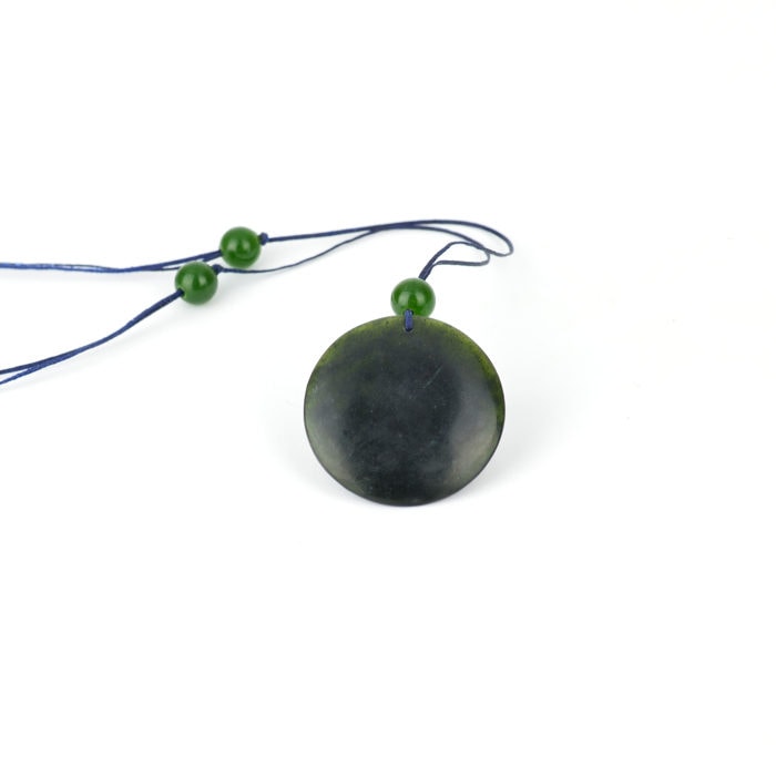 small tangiwai disc pendant with beads