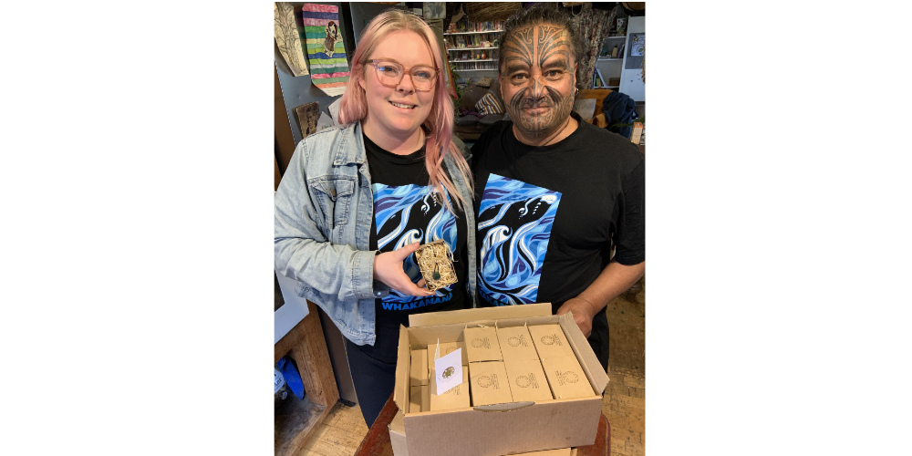 Tim and Tayla with Tū Māia boxes