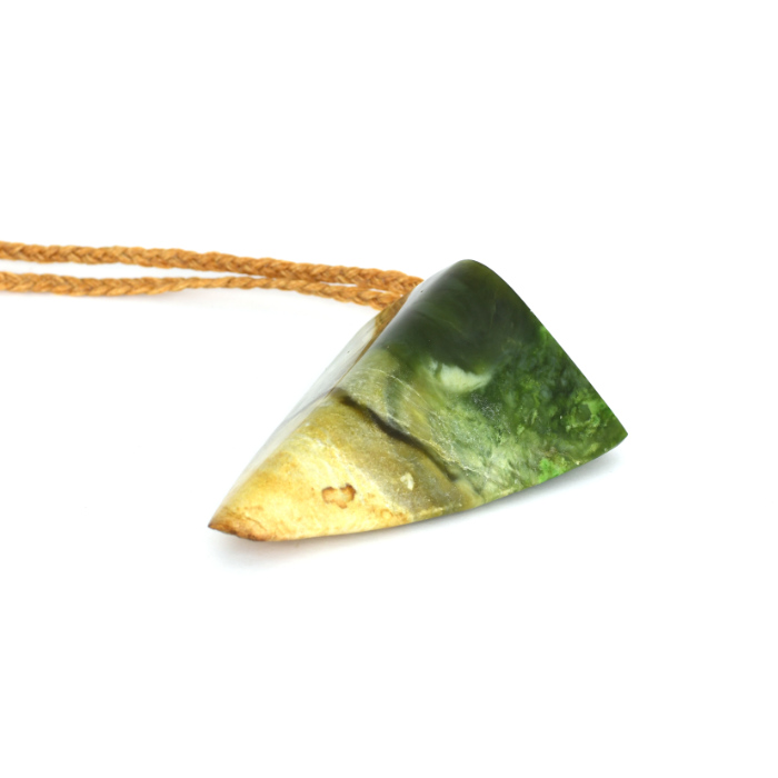 pounamu with taniwha face, large triangle pounamu pendant