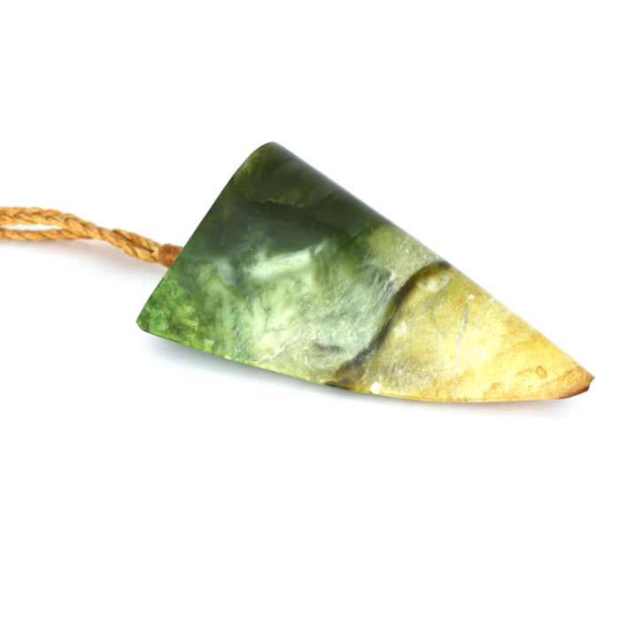 pounamu with taniwha face, large triangle pounamu pendant