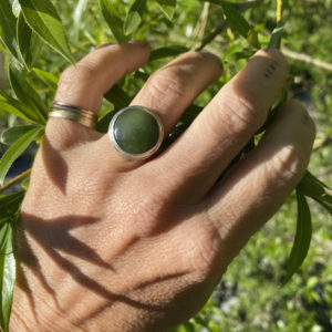 small green pounamu ring on sterling silver
